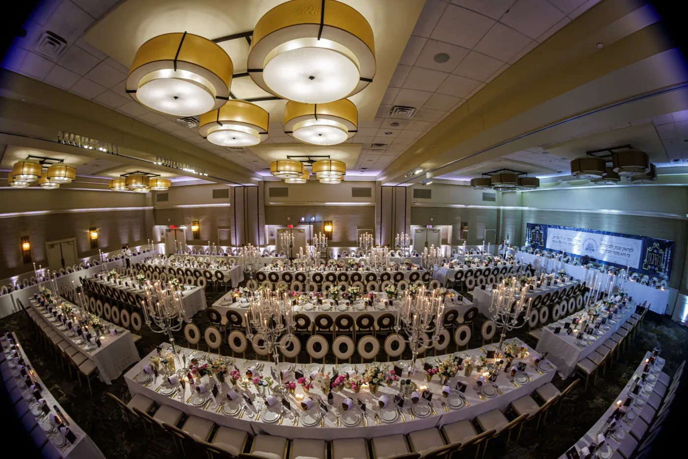 The dining hall set for Shabbos